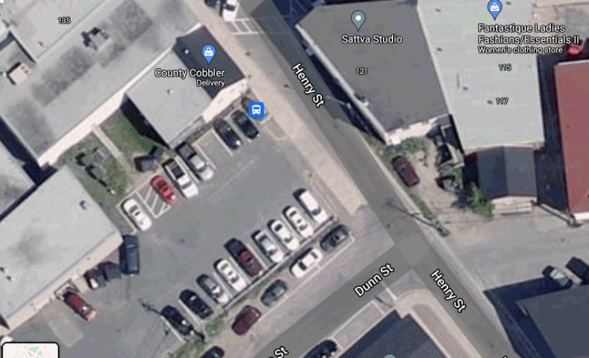 City sells parking lot to business for expansion