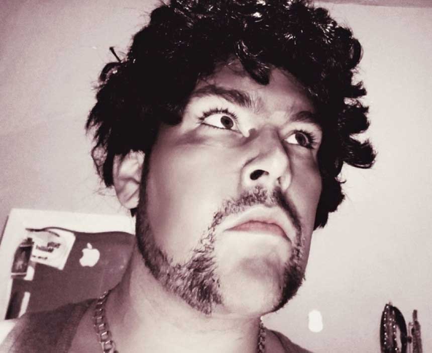 Man arrested for possessing stolen car and hatchet