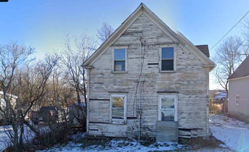 Council votes to demolish three unsightly properties