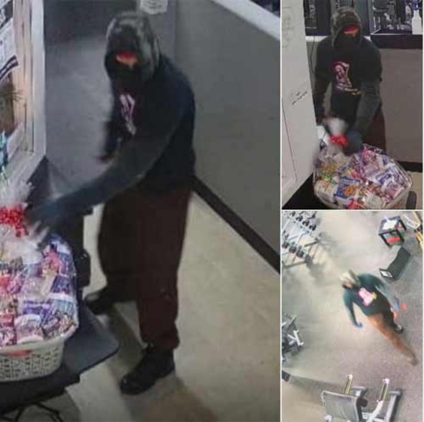 Tozer charged with robbery.  Has lengthy related record.