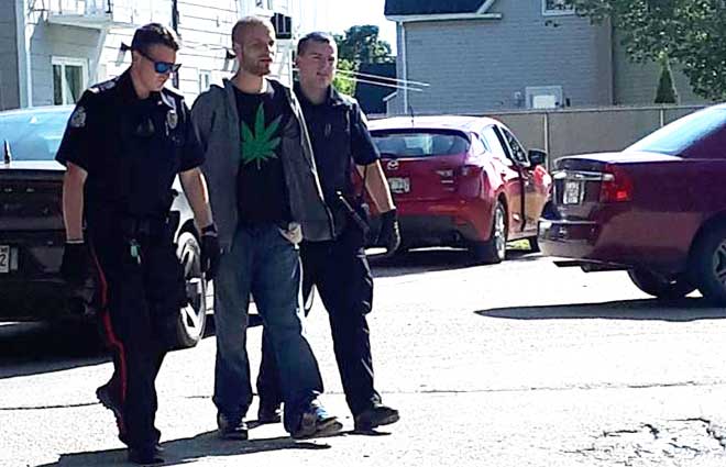 Martin arrested.  Stolen car found nearby.